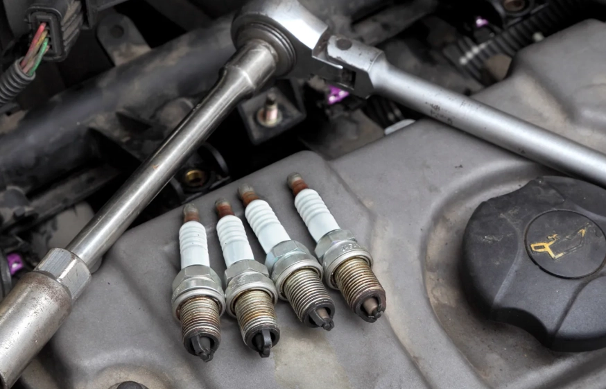Can I replace spark plugs myself?